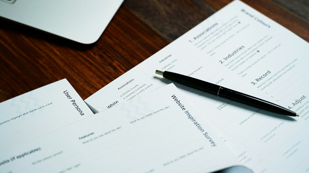 insurance policy documents on desk