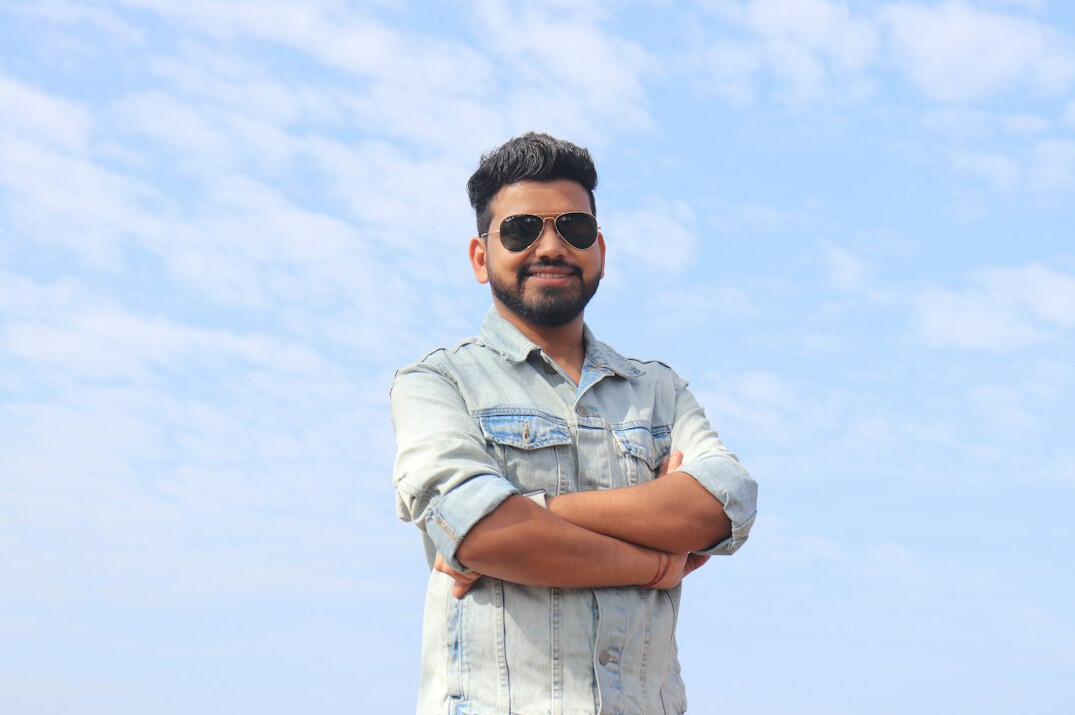 Smiling bearded man in casual shirt portrait