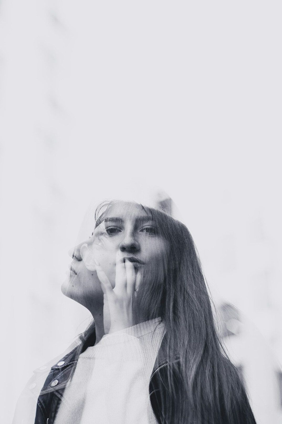 Smiling young woman with long hair portrait