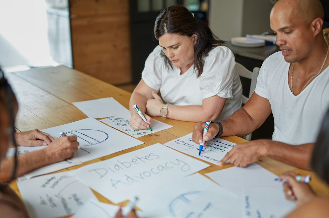 Team of colleagues collaborating around a table