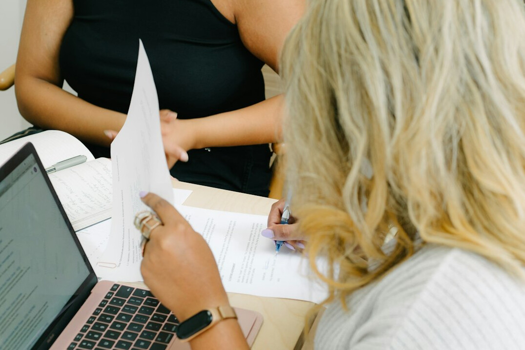 insurance documents and laptop