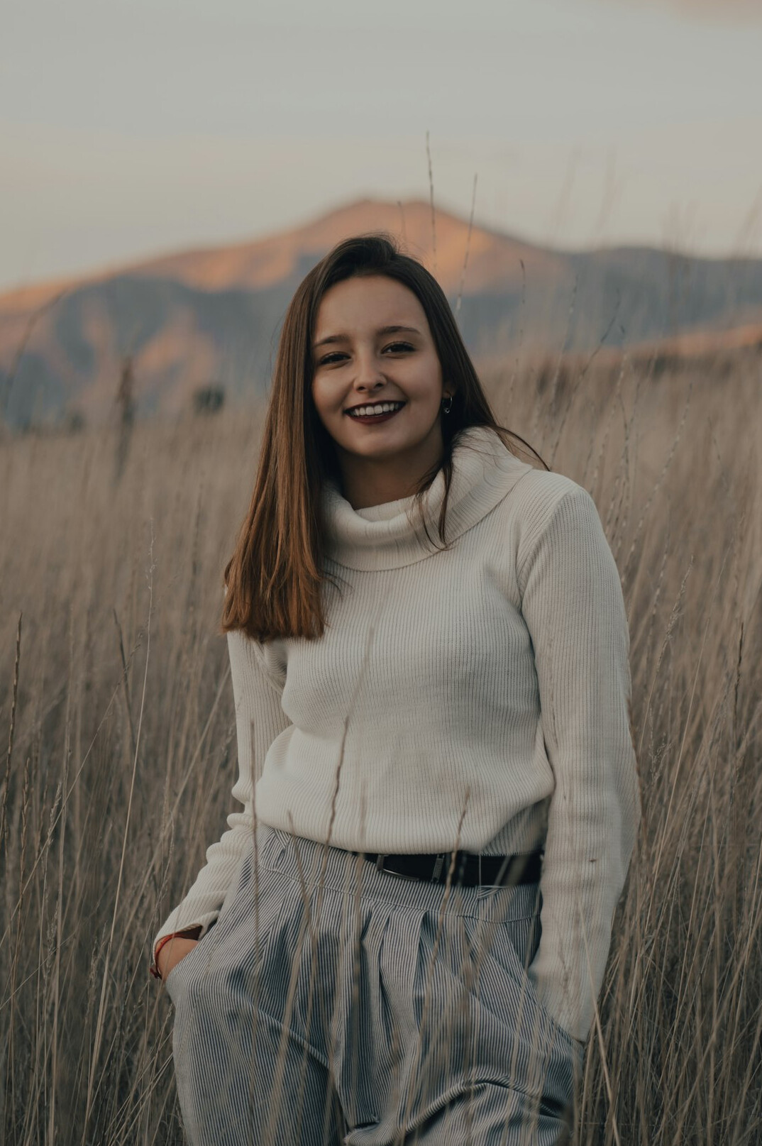Professional woman with dark hair smiling portrait