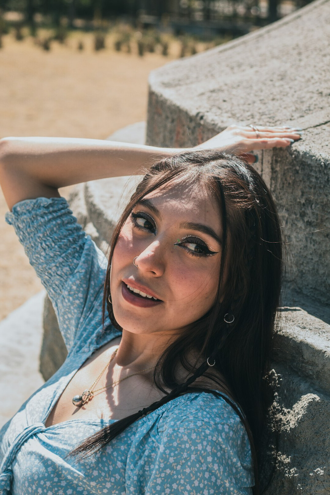Young woman with brown hair smiling portrait